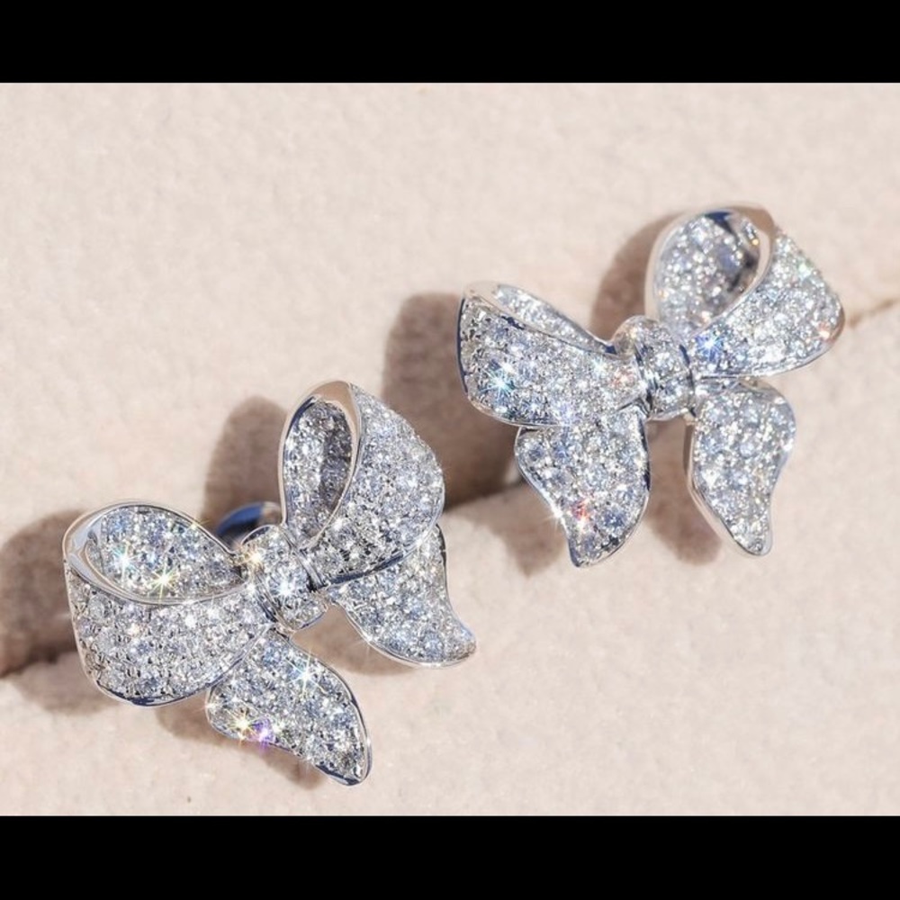 White sapphire gemstone bow earrings